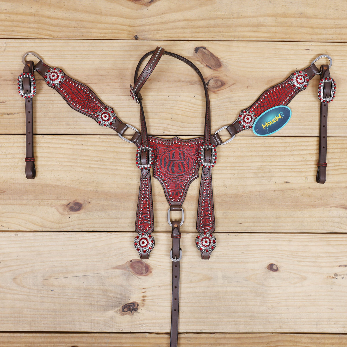 featuring single ear design with red alligator printed headstall along with silver studs