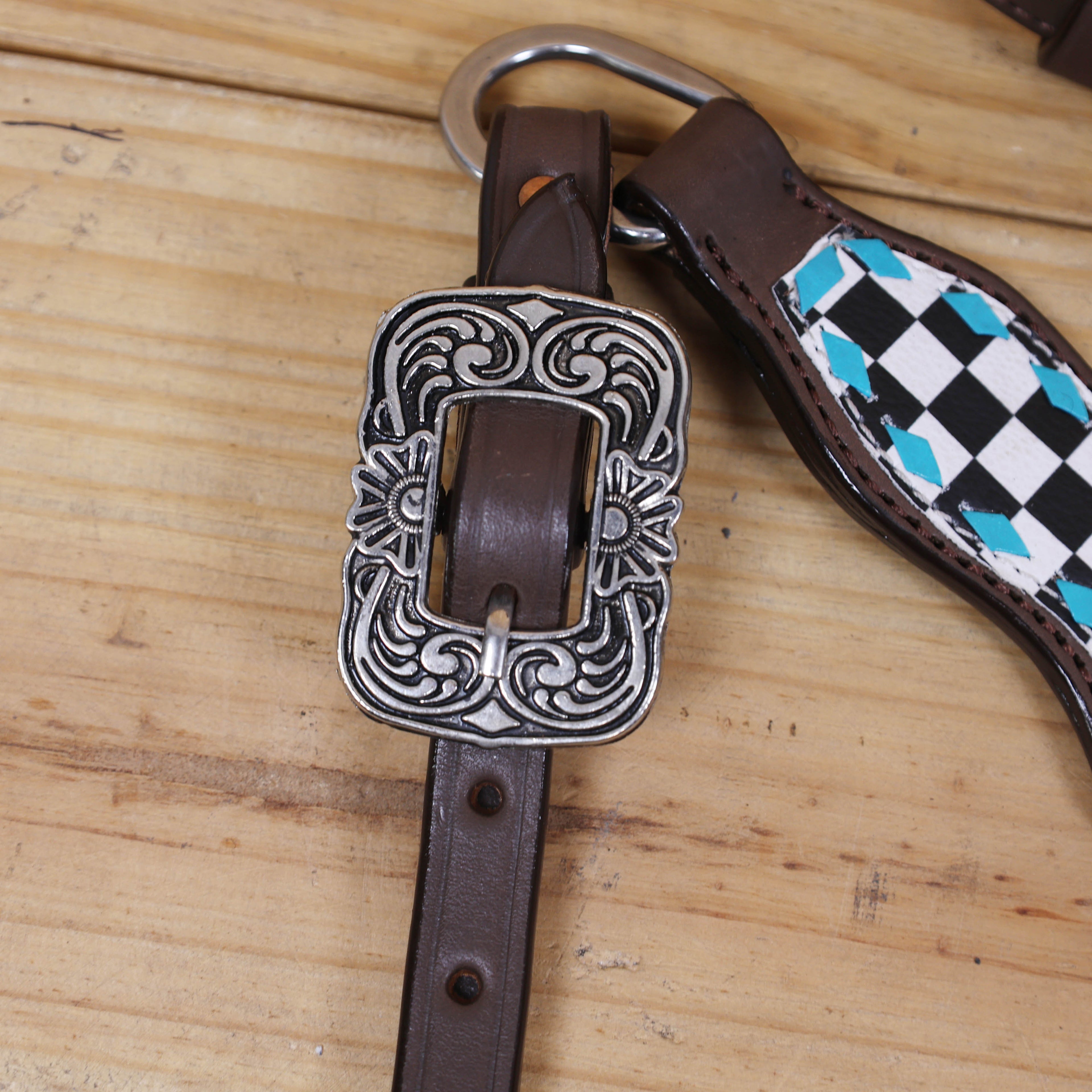Hand finished Western leather tack set with checkyard print and antique nickel buckles