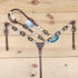 Western headstall and breast collar set with rawhide knotting and 3D golden Dollar conchos