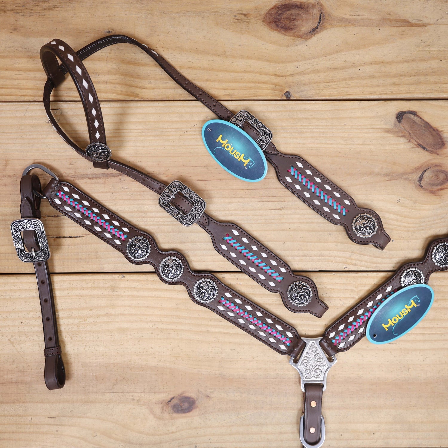 western headstall set with white rawhide braided leather tack set with antique finish and copper rivet buckles 