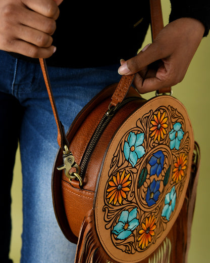 MOUSM Full Grain Cow Hide Leather Crossbody Bag - Small Round Ladies Bag Decorated with Hand-Painted Flower and Leaf Carving with Leather Fringe, High-Quality Zipper Closure with Removable and Adjustable Strap