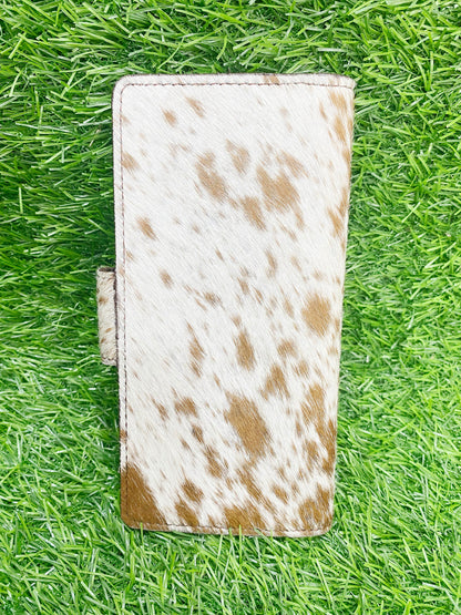 ladies clutch bag having natural cowhide pattern. Ladies clutch bag having natural cowhide pattern  by MOUSM