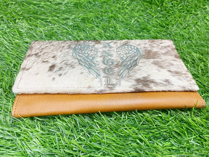 ladies clutch bag having natural cowhide pattern. Lady&
