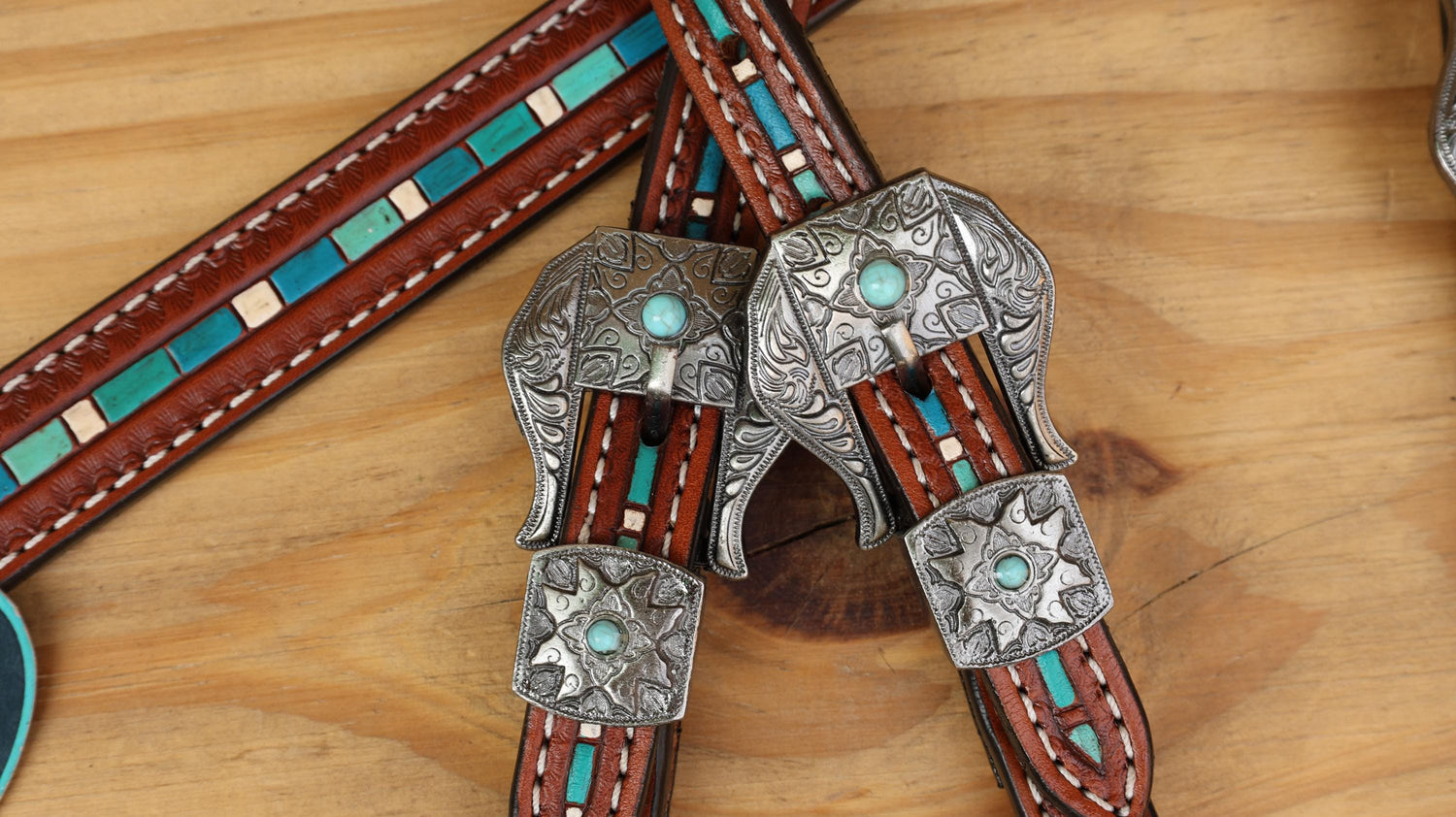 Leather Headstall Tack set gifts for horse lovers. Horse Headstall set with hand striped tooled with turquoise colouring and buck stitching.