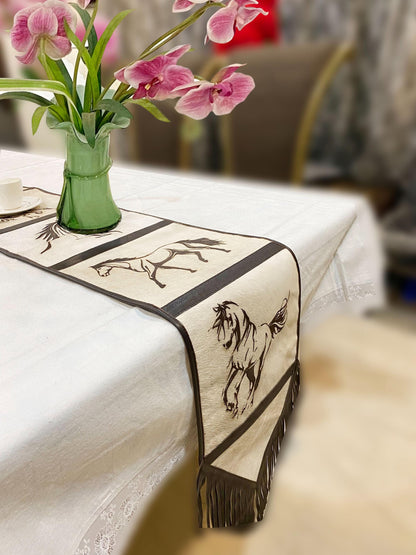 Cow Hide table runner Leather Table runner on real ceramic colored cow hide decorated with laser engraved smart horses designs black fringe.