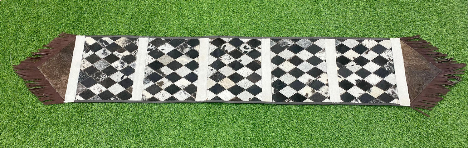 Cow Hide table runner Leather Table runner with chess like diamond shaped patches on real cow hide real leather fringe at both side corners