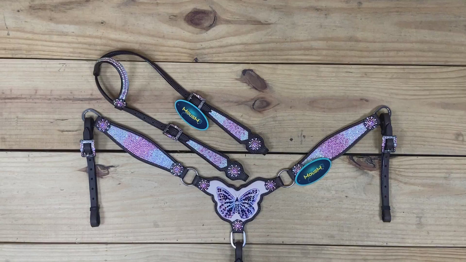 western tack set with pink and holographic dazzle stones, multicolor berry conchos, and black and AB stone accents on gladiator breast collar.